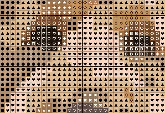 Close-up of the Goldendoodle chart around the eyes, with a symbol in every square